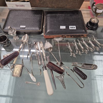 Lot 989 - A group of various silver and plated cutlery...