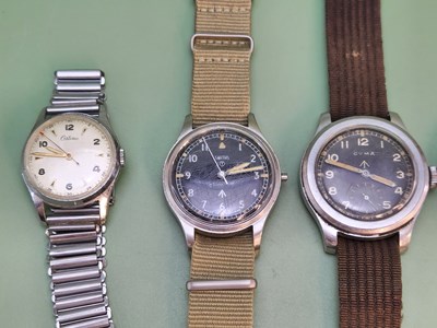 Lot 1225 - Two British military watches, Cyma 'Dirty...