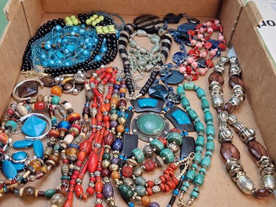 Lot 1228 - A large collection of beaded necklaces