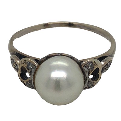 Lot 1237 - A pearl and diamond set ring, unhallmarked,...