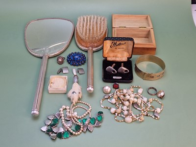 Lot 1238 - A sterling stamped ring band, an eastern ring,...