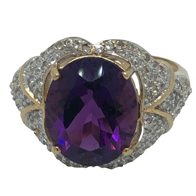 Lot 1243 - A 9ct hallmarked gold and gemset large...