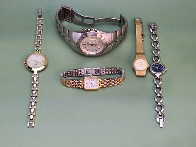 Lot 1255 - A ladies' Tissot wrist watch, a Fossil and two...