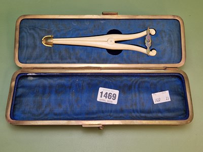 Lot 1469 - A late Victorian glove box with fitted bone...