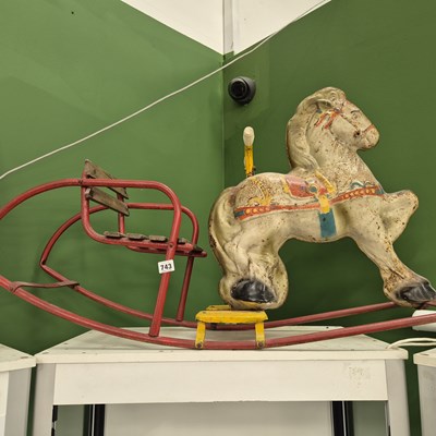 Lot 743 - A vintage tin rocking horse, probably MoBo