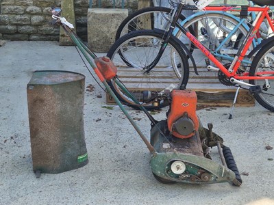 Lot 489 - A Qualcast petrol vintage push mower with a...