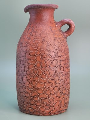 Lot 1207 - A studio pottery flask with a lug handle on...