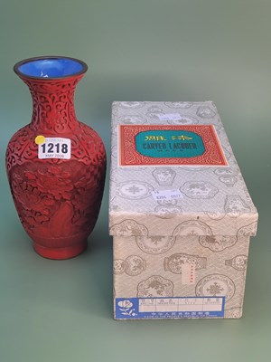 Lot 1218 - A boxed Chinese carved cinnabar lacquer vase...