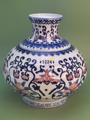 Lot 1224 - A Chinese underglaze blue and red vase, the...