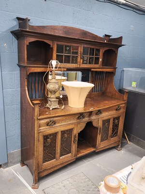 Lot 1238 - An Art Nouveau oak sideboard by Shapland and...