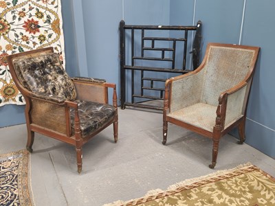 Lot 1244 - Two early 19th century mahogany library chairs,...