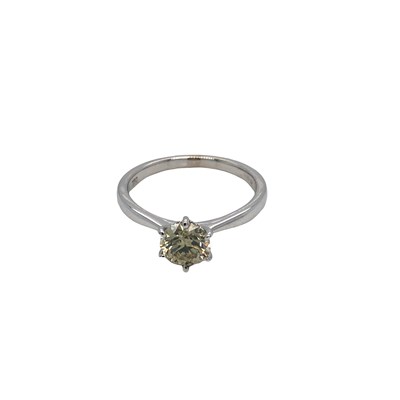 Lot 1069 - A certificated 18ct white gold six claw-set...
