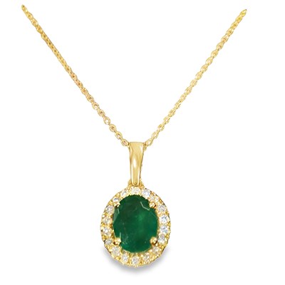 Lot 1081 - A 9ct yellow gold oval emerald and round...
