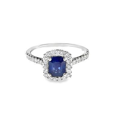 Lot 1085 - A hallmarked platinum sapphire and diamond...