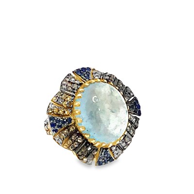 Lot 1092 - A silver gilt ballerina-style ring set with a...