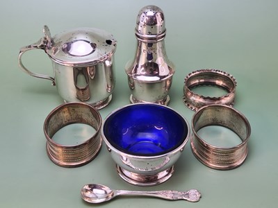 Lot 1089 - Hallmarked silver; two matching napkin rings...