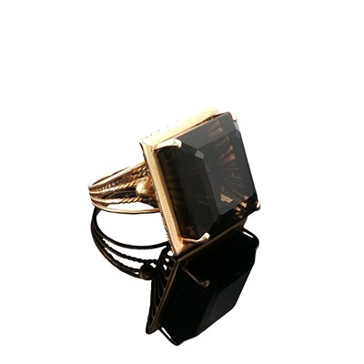 Lot 1003 - A vintage smoky quartz cocktail ring, set with...