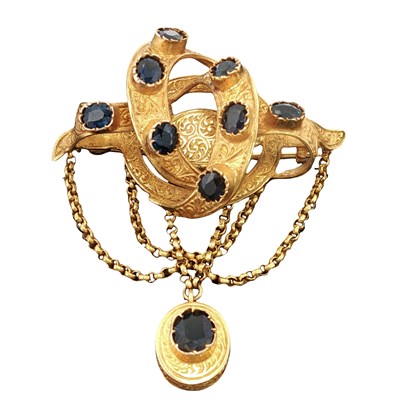 Lot 1001 - An ornate antique 18ct gold brooch of...