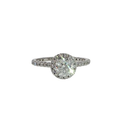 Lot 1015 - An 18ct hallmarked gold halo cluster ring,...