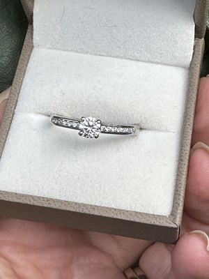 Lot 1018 - A hallmarked platinum and diamond solitaire...