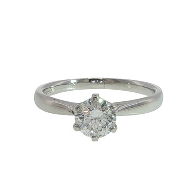 Lot 1019 - A hallmarked platinum round brilliant cut...