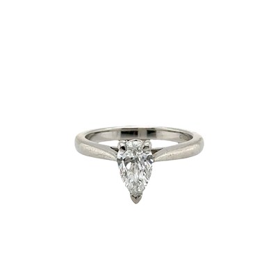 Lot 1020 - A hallmarked platinum solitaire ring, claw set...