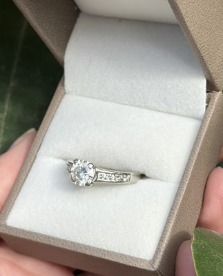 Lot 1021 - A hallmarked platinum diamond solitaire ring,...