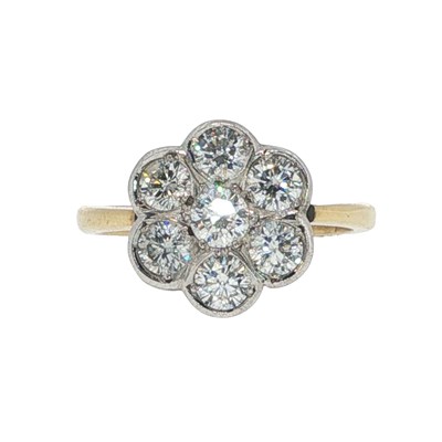 Lot 1027 - Diamond daisy cluster ring, designed as a...