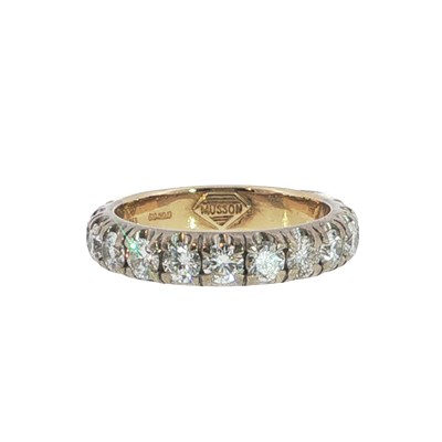 Lot 1029 - Diamond set half hoop ring by Musson, set with...