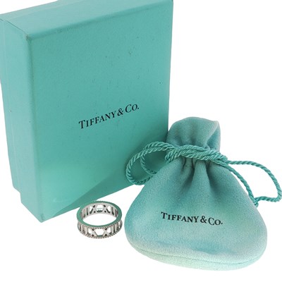 Lot 1032 - Tiffany & Co. Atlas ring, designed with Roman...