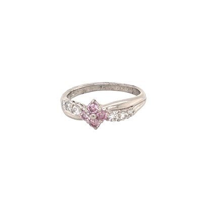 Lot 1036 - Diamond set flowerhead ring, centred with pink...