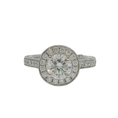 Lot 1045 - A hallmarked platinum diamond halo cluster...