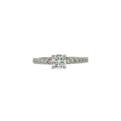 Lot 1046 - A hallmarked platinum diamond solitaire ring,...