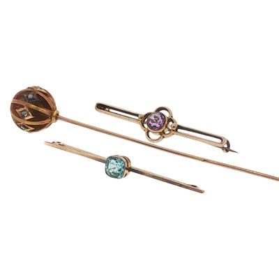 Lot 1049 - A diamond set hat pin, the spherical terminal...