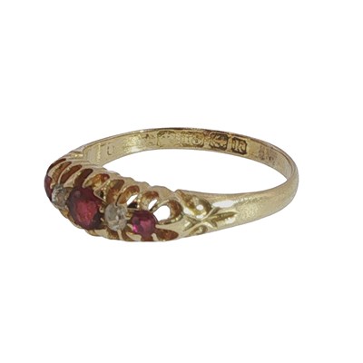 Lot 1052 - A vintage 18ct hallmarked gold ruby and...