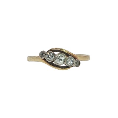 Lot 1056 - An 18ct gold and platinum five-stone diamond...
