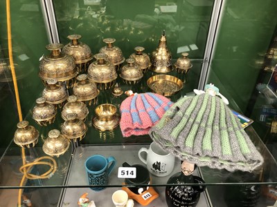 Lot 514 - A collection of brass table bells etc., and...