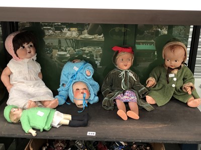Lot 519 - A collection of antique and later dolls,...