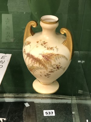 Lot 537 - A Royal Worcester twin-handle blush ivory vase...