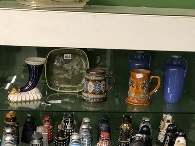 Lot 539 - A Ruskin pottery button, Royal Doulton twin...