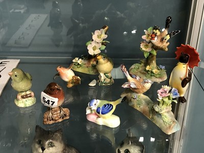 Lot 547 - A collection of bird figures, to include...
