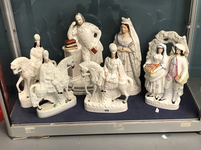 Lot 550 - A collection of Staffordshire-style flat back...