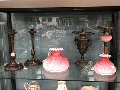 Lot 567 - A pair of turned wooden candesticks, two pink...