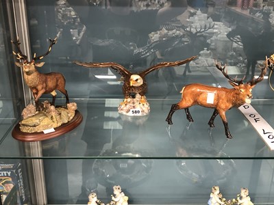 Lot 580 - A Beswick 1018 bald eagle figure, a Border...