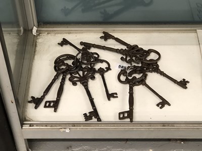 Lot 585 - A collection of oversized decorative cast...