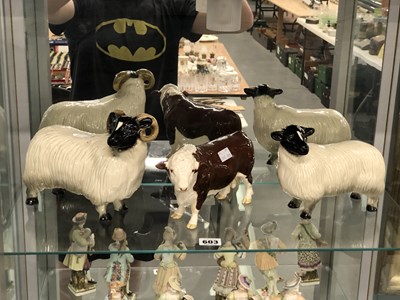 Lot 603 - A Beswick bull, with a black-faced ram and ewe