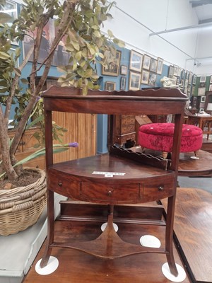 Lot 90 - A19th century mahogany two tier corner stand...