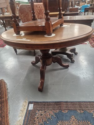 Lot 94 - A 19th century tilt top table, the oval top...