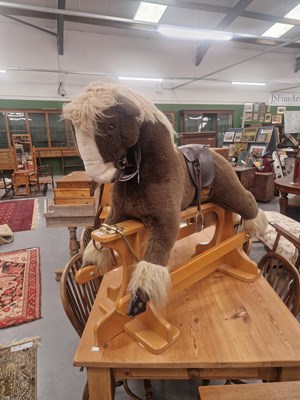 Lot 114 - A handmade plush rocking horse on stand by...