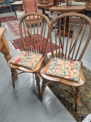 Lot 115 - Four oak and elm hoop and spindle back kitchen...